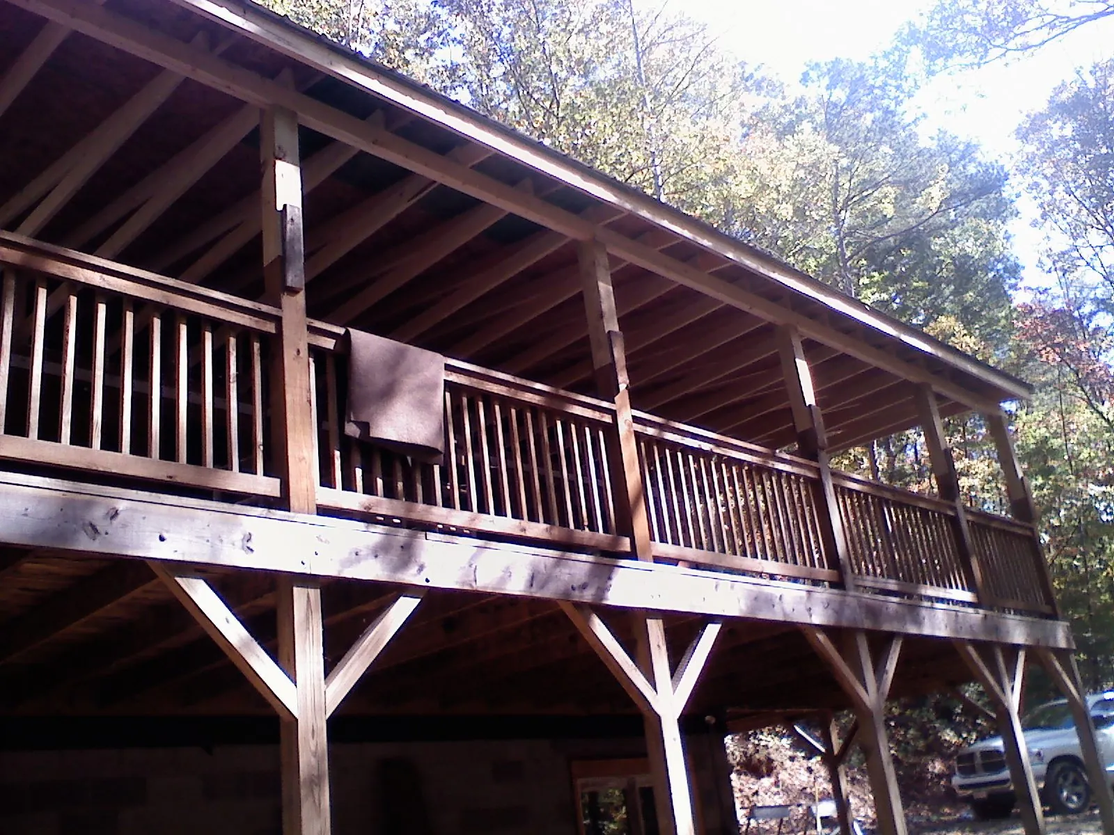 Timber framing under a new elevated porch and deck — Roof Leak Repair in Callender by Roofing Brothers